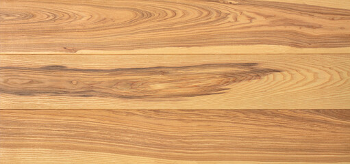 Obraz premium The texture of ash boards with a pronounced pattern of wood fibers.