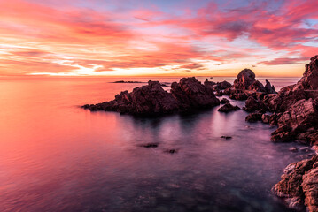 Beautiful sky on sunrise at the Mediterranean Sea (Esculls de Canyet, Spain, Catalonia)