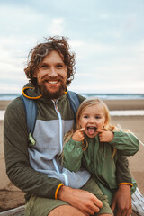 Family father with daughter outdoor dad walking with child grimace face vacations lifestyle together Fathers day holiday - obrazy, fototapety, plakaty