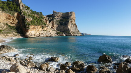Fototapeta na wymiar Rocky picturesque beach in Spain