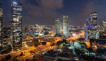 Tel Aviv-Yafo, Israel - September 23, 2020: Tel Aviv night aerial panorama. Modern glass skyscrapers