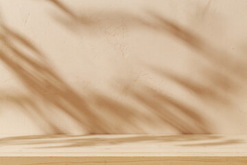 Wooden table mockup on stucco background with branch shadows on the wall. Mock up for branding...