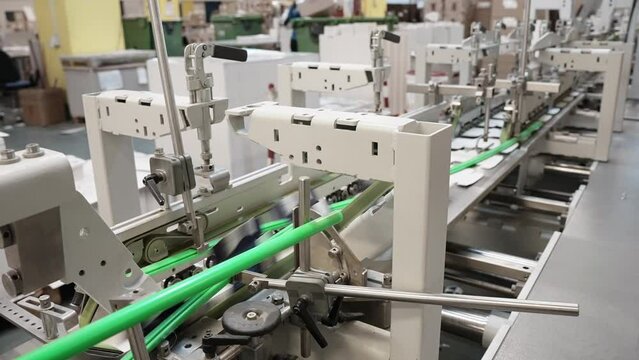 Printing house. Paper submission. Offset printing process.