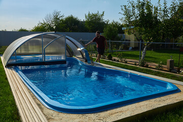 swimming pool with view of the garden