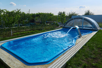 swimming pool with view of the garden