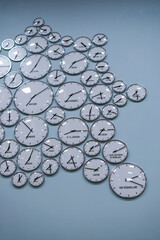 A set of wall clocks for time zones of different cities of the world. World time.