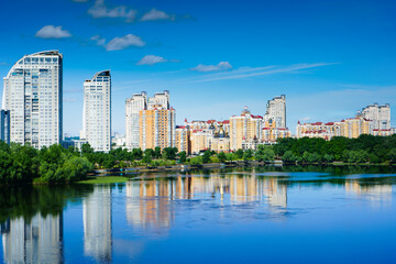 Fototapeta na wymiar View at Obolonska embankment, residential district in Kyiv, Ukraine 