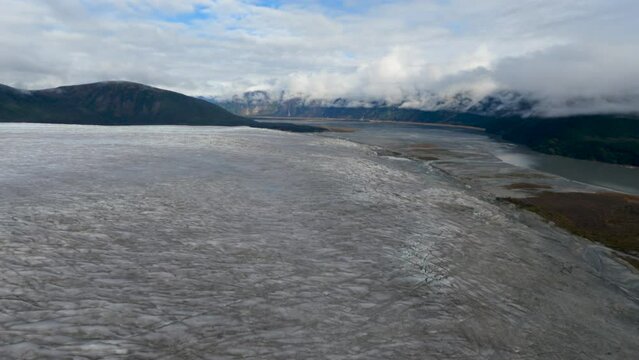 Where the Taku Glacier Meets Taku River Aerial View Flying Above Glacial Ice Field