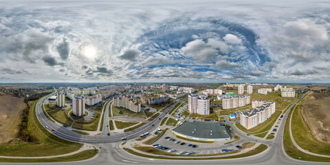 aerial seamless spherical hdri 360 panorama view above road junction with traffic in residential...