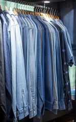 blue denim shirts are in a store