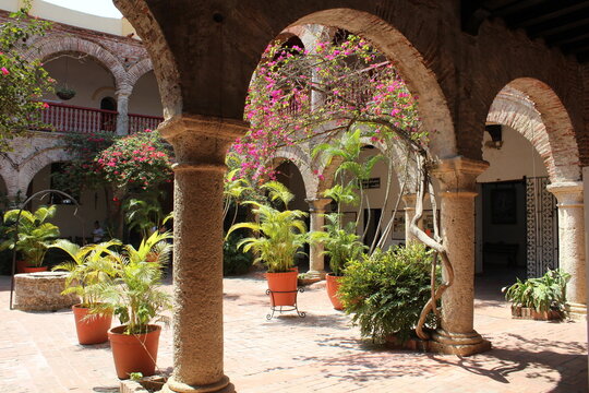 Interior square courtyard with trees, flowers, arches Convent (Convento) of Santa Cruz de la Popa Cartagena Colombia