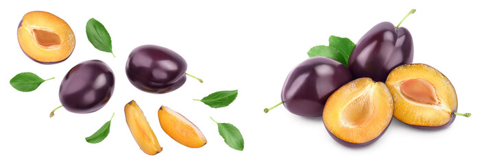 fresh purple plum and half with leaves isolated on white background with  full depth of field. Top view. Flat lay