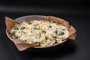 Delicious quiche with broccoli, cheese, chicken, spices and herbs