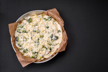 Delicious quiche with broccoli, cheese, chicken, spices and herbs