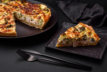 Delicious quiche with broccoli, cheese, chicken, spices and herbs