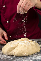 Professional cook makes yeast dough