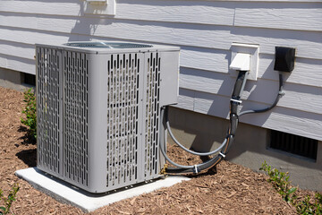 Air Conditioner unit attached to residential property