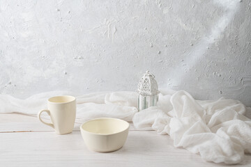 white kitchenware of a mug and a bowl on white background
