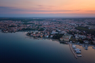 Scenic aerial view of Zadar old city, beautiful cityscape in dusk before sunrise, Dalmatia,...