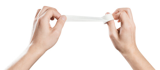 Hands unrolling adhesive plaster, cut out