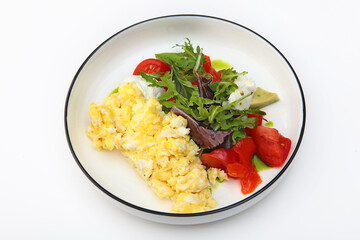Omelet with tomatoes and herbs. Healthy breakfast. Vegetarian menu.Healthy food concept. Copy space. Top view.Mock up.