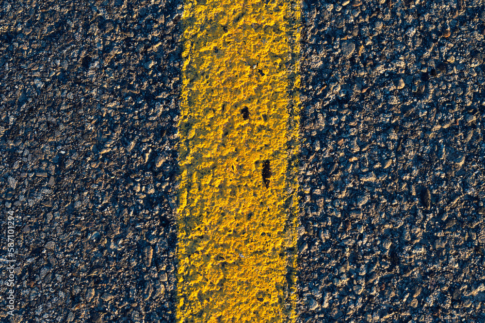 Wall mural asphalt rod yellow line close up textured backgrounds theme patterns web design