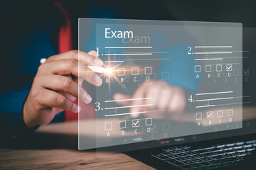 online exam concept, choose correct answer in test. checklist and online testing on laptop. online exam test with laptop. on-line questionnaire results on desktop. quiz.