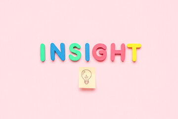 Word INSIGHT and sticky paper with drawn light bulb on pink background