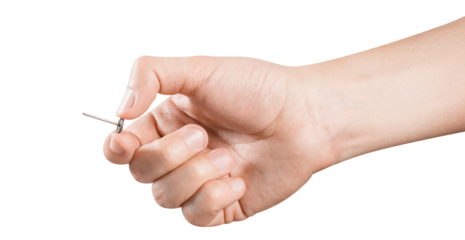 Hand holding a small pin, cut out