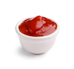 Bowl of tasty ketchup isolated on white background