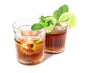 Glasses of cold rum with lime on white background