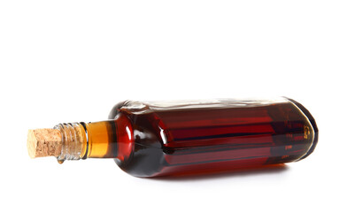 Bottle of rum on white background
