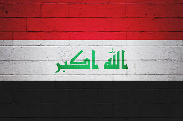 Fototapeta premium Flag of Iraq painted on a wall