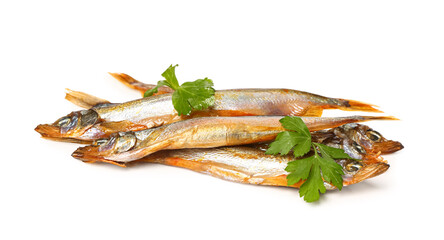 Delicious smoked capelin with parsley isolated on white background