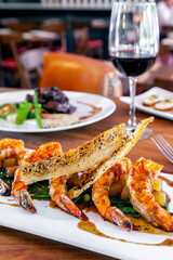 Garlic Shrimp with sesame seed toast and red wine