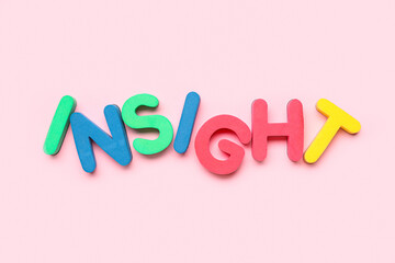Word INSIGHT on pink background