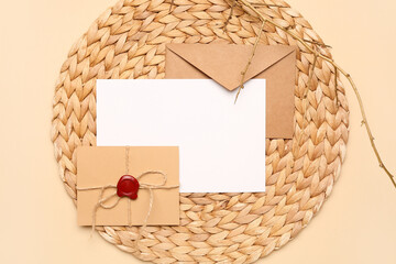 Composition with blank card, envelopes and tree branch on color background, closeup