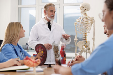 Doctor giving lecture for interns in university