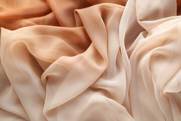 Beautiful beige tulle fabric as background, top view