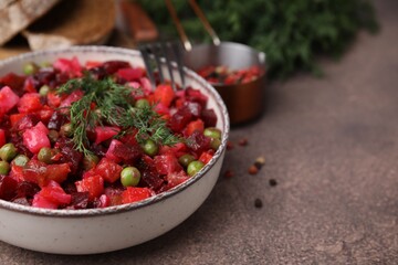 Delicious vinaigrette salad on grey table, closeup. Space for text