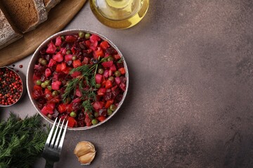 Delicious vinaigrette salad on grey table, flat lay. Space for text