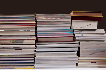 Several books are piled up. a pile of books. a bundle of books. books
