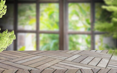 Empty wooden table. Against the background of a blurred background