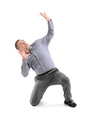 Scared mature man on white background