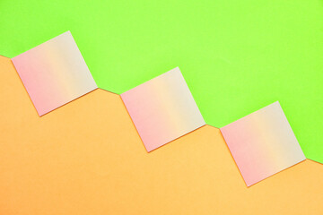 Composition with sticky notes on color background