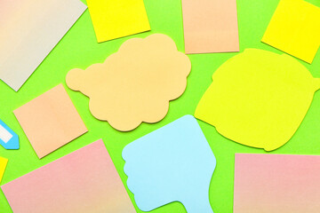 Composition with sticky notes on green background