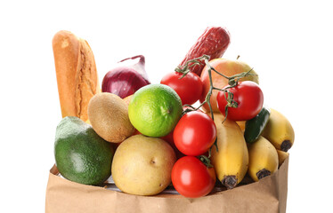 Paper bag with vegetables and fruits on white background