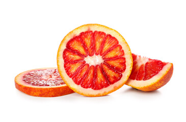 Tasty slices of blood orange fruit on white background