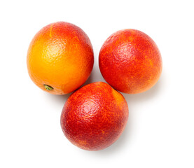Whole tasty blood oranges on white background