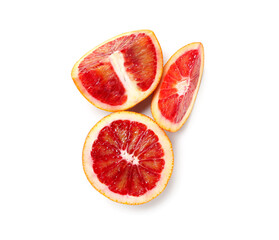 Tasty slices of blood orange fruit on white background